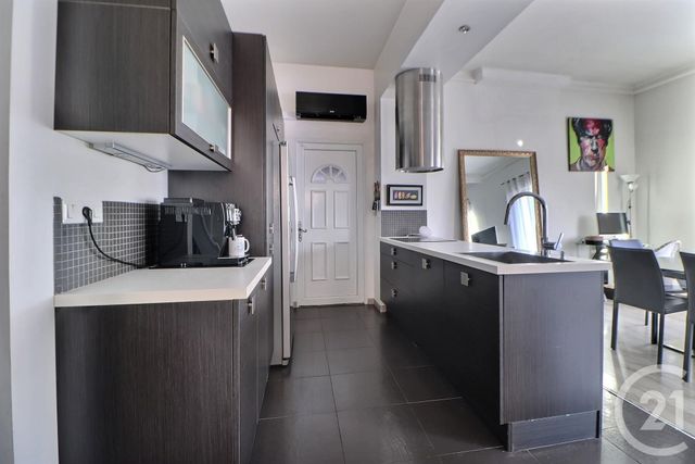 Afficher la photo en grand maison à vendre - 4 pièces - 97.01 m2 - ROMAINVILLE - 93 - ILE-DE-FRANCE - Century 21 Dossimmo